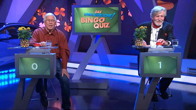 Lutz (rechts im Bild) beim BIN<em>GO!</em>-Quiz 